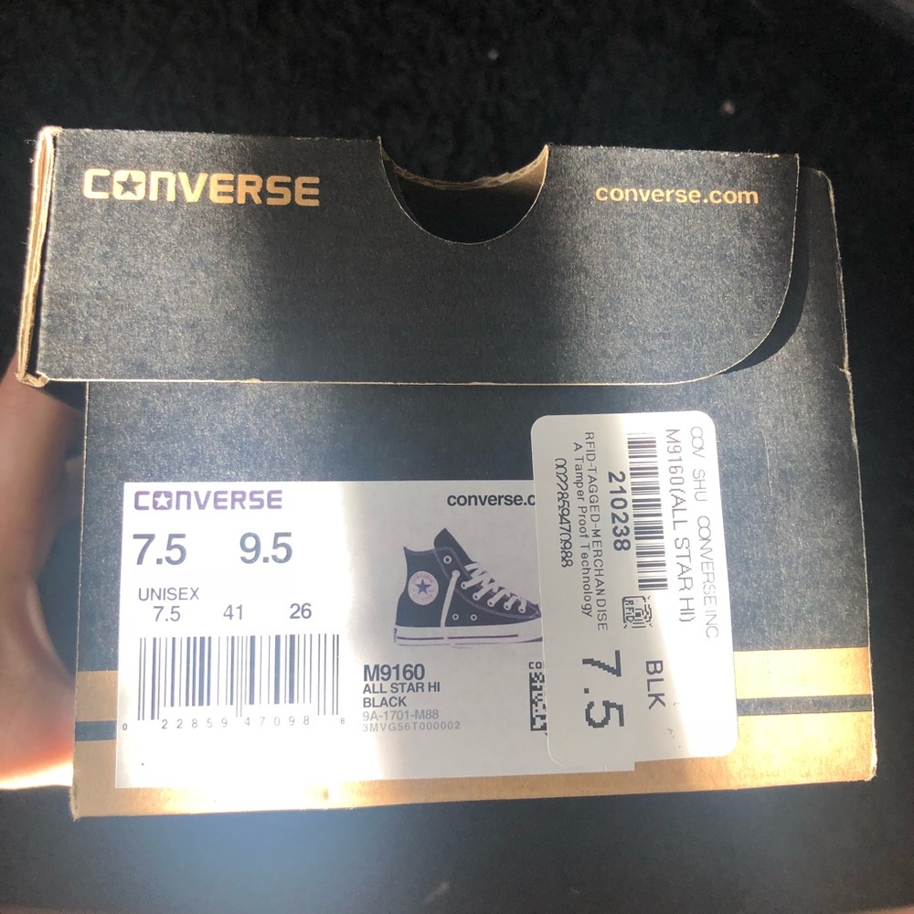 Black high top Converse women’s 9.5 men’s 7.5